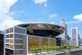 The Singapore Supreme Court Building with its unique flying saucer shaped roof, set against the Financial District Royalty Free Stock Photo