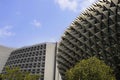 Beautiful detail view of modern and amazing Esplanade theater under a blue sky with hotel and business block building behind