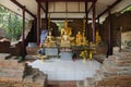 Many golden color buddha image statues in ubosot at Wat Pho Kao Ton in Bang Rachan village at Sing Buri , Thailand