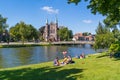 Singelgracht with church and relaxing people, Alkmaar, Netherlan Royalty Free Stock Photo