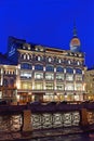 Singer house on the embankment of the Moika river. Night.