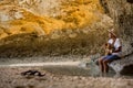 Singer plays on beach