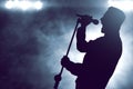 Singer singing silhouette on the stage Royalty Free Stock Photo