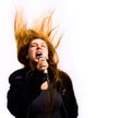 Singer woman with hair in motion isolated on white