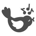 Singing bird with musical notes solid icon, gardening concept, bird sings a song vector sign on white background, glyph Royalty Free Stock Photo