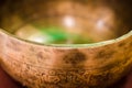 Singing Bowl on a Pillow close-up view Royalty Free Stock Photo