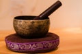 Singing Bowl on a Pillow with Wand Royalty Free Stock Photo