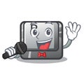Singing button B on a mascot keyboard Royalty Free Stock Photo