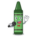 Singing green crayon in the mascot shape
