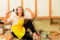 Singing housewife at home Royalty Free Stock Photo