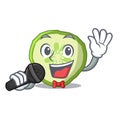 Singing mascot slice cucumber to cook vegetable