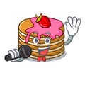 Singing pancake with strawberry mascot cartoon