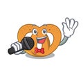 Singing pretzel mascot cartoon style