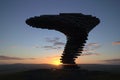 The Singing Ringing tree silhouetted at sun rise.