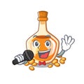 Singing sea buckthorn oil in cartoon bowl Royalty Free Stock Photo