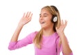 Singing teenage girl with headphones