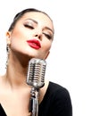 Singing Woman with Retro Microphone Royalty Free Stock Photo