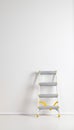 Single aluminum folding metal step ladder leaning against white plaster wall