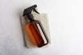 Single amber brown spray bottle for cleaning