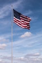 Single American Flag with Cloudy Sky