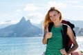 Single american woman with backpack travelling to Rio de Janeiro