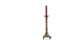 Single arm candlestick made of brass made in old decorative style, isolated on a white background Royalty Free Stock Photo