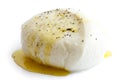 Single ball of mozzarella cheese covered with oil and pepper, is