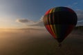 Single balloon over misty ground