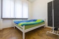 Single bed bedroom in hostel Royalty Free Stock Photo
