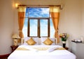 Single bed neatly done up in a high class hotel ro Royalty Free Stock Photo