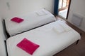 Single beds at the beautiful and cosy hotel room Royalty Free Stock Photo