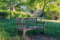 Single bench in the park. Royalty Free Stock Photo