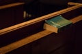 A Bible left on a pew in St James`s Church, London, UK Royalty Free Stock Photo