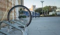 a single bicycle wheel on the street due to stealing Royalty Free Stock Photo