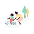 Single black father and son african americans teaching kid riding bike on street Royalty Free Stock Photo