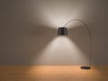 Single black floor lamp switch on in room - grey wallpaper