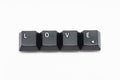 Single black keys of keyboard with different letters LOVE Royalty Free Stock Photo