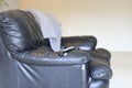 Single black leather couch isolated in a living room Royalty Free Stock Photo
