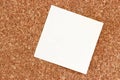 Sticky note on a cork pinboard Royalty Free Stock Photo