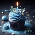 Single blue Cupcake With a Burning Candle on blue Background Royalty Free Stock Photo