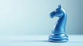 A single blue knight chess piece on a light blue background, representing strategy and tactical planning. Generative AI Royalty Free Stock Photo