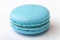 Single Blue Macaron Cookie on White Background french macaron pastry Royalty Free Stock Photo