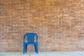 Single blue plastic chair