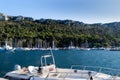 Single boat docked at the pier float in the mediterranean sea