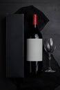 Single Bottle of Wine on a black Wood Table from top view Royalty Free Stock Photo