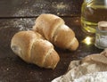 Single bread on a rustic wooden countertop Royalty Free Stock Photo