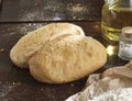 Single bread on a rustic wooden countertop ,
