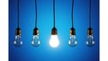 A Single Bright Light Bulb Stands Out From The Rest Royalty Free Stock Photo