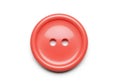 Bright orange oval two hole button isolated on white background Royalty Free Stock Photo