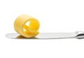 Rolled butter curl on knife isolated on transparent background Royalty Free Stock Photo